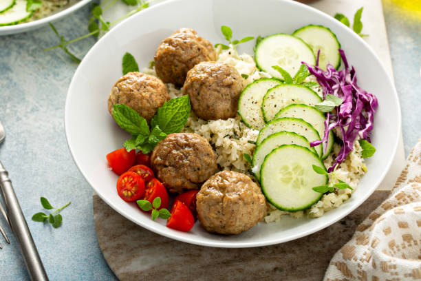 Healthy lunch bowl with firecracker meatballs